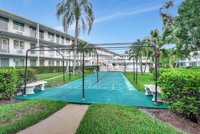 15610 NE 6th Ave NE Unit 10C, Miami, FL 33162 - surrounding community featuring a yard and shuffleboard
