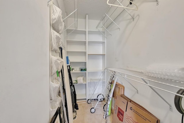 263 Preston Unit G, Boca Raton, FL 33434 - spacious closet featuring tile patterned floors