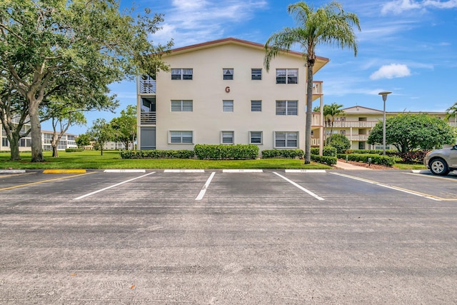 263 Preston Unit G, Boca Raton, FL 33434 - view of property featuring uncovered parking
