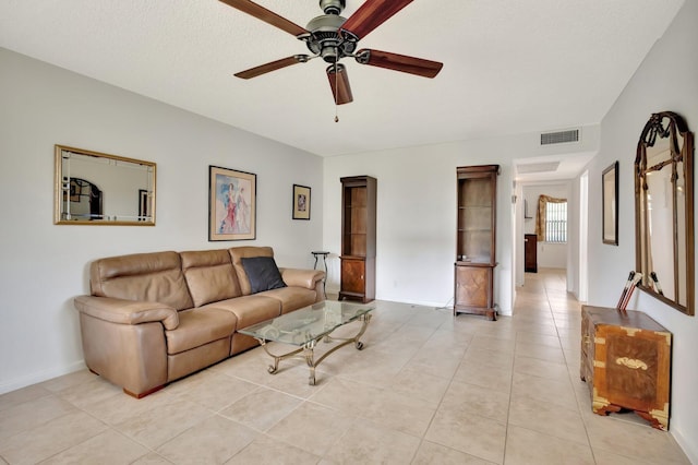 263 Preston Unit G, Boca Raton, FL 33434 - living area with a ceiling fan, light tile patterned flooring, and baseboards