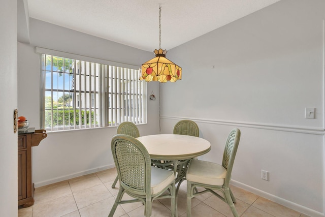 263 Preston Unit G, Boca Raton, FL 33434 - dining area with baseboards and light tile patterned floors