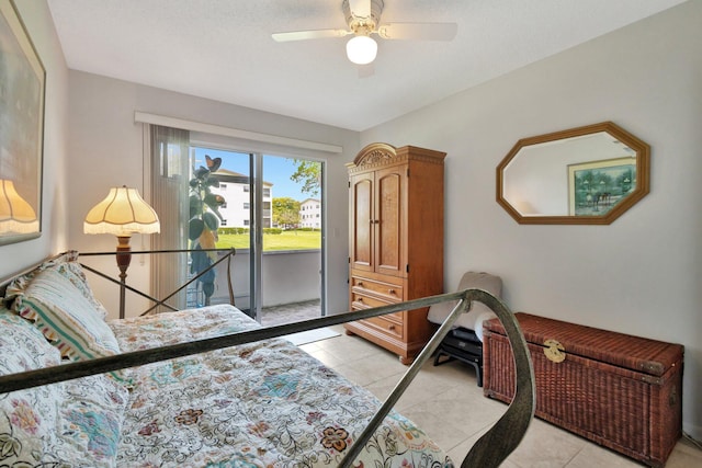 263 Preston Unit G, Boca Raton, FL 33434 - bedroom featuring access to exterior, light tile patterned floors, and a ceiling fan