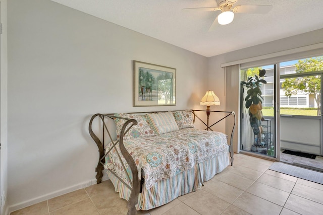 263 Preston Unit G, Boca Raton, FL 33434 - bedroom featuring access to exterior, tile patterned floors, baseboards, and ceiling fan