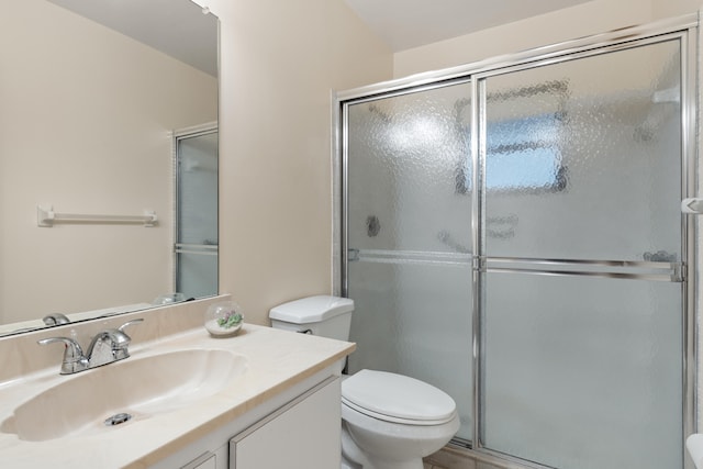 13623 Via Aurora Unit C, Delray Beach, FL 33484 - bathroom with vanity, a shower with door, and toilet
