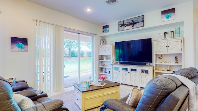 7144 Maidstone Dr, Port Saint Lucie, FL 34986 - living room with light colored carpet and recessed lighting
