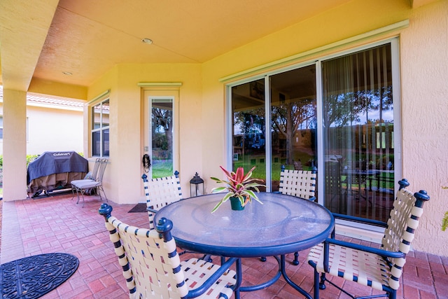 7144 Maidstone Dr, Port Saint Lucie, FL 34986 - view of patio featuring outdoor dining area