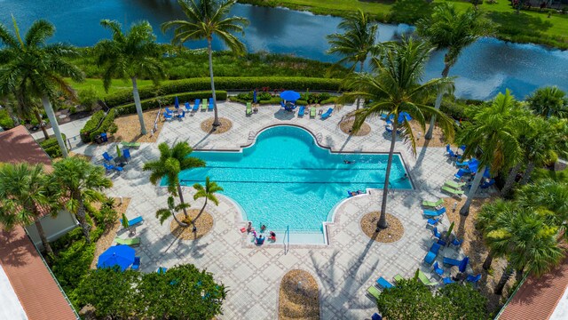7144 Maidstone Dr, Port Saint Lucie, FL 34986 - community pool featuring a patio area and a water view