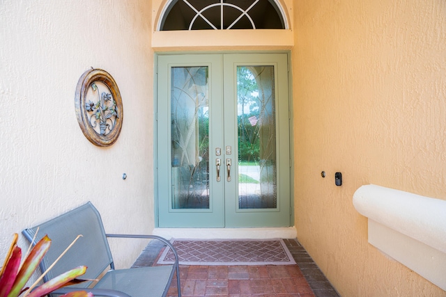 7144 Maidstone Dr, Port Saint Lucie, FL 34986 - entrance to property with french doors and stucco siding