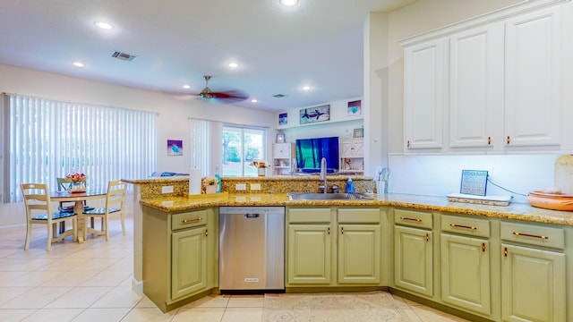 7144 Maidstone Dr, Port Saint Lucie, FL 34986 - kitchen featuring stainless steel dishwasher, a sink, ceiling fan, green cabinetry, and a peninsula