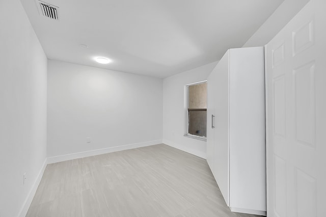 5365 NW 49th St, Coconut Creek, FL 33073 - spare room featuring baseboards and light wood-style floors