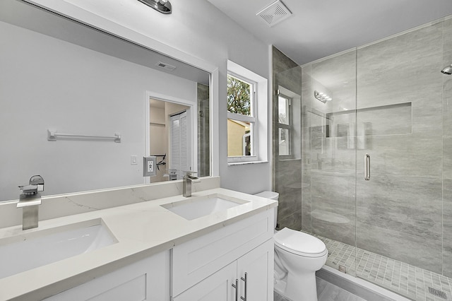 5365 NW 49th St, Coconut Creek, FL 33073 - full bath featuring toilet, double vanity, and a shower stall
