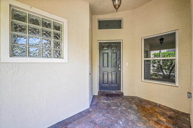 5365 NW 49th St, Coconut Creek, FL 33073 - doorway to property featuring stucco siding and a porch