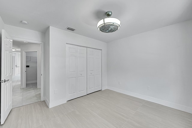 5365 NW 49th St, Coconut Creek, FL 33073 - unfurnished bedroom with a closet and baseboards