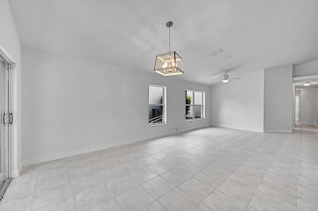 5365 NW 49th St, Coconut Creek, FL 33073 - empty room featuring a ceiling fan, light tile patterned floors, and a chandelier