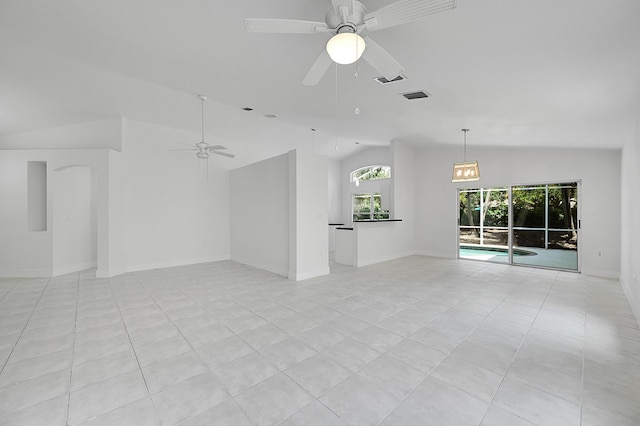 5365 NW 49th St, Coconut Creek, FL 33073 - unfurnished living room with vaulted ceiling, ceiling fan, and light tile patterned flooring