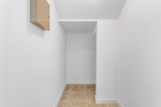 1463 N Jeaga Dr, Jupiter, FL 33458 - walk in closet with light tile patterned flooring
