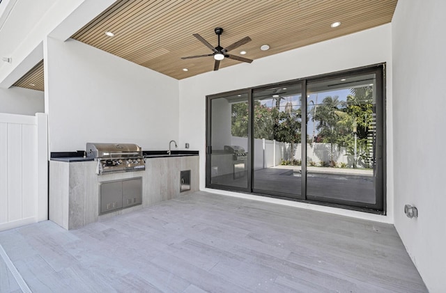 1233 NE 12th Ave Unit A, Fort Lauderdale, FL 33304 - view of patio featuring a ceiling fan and a sink