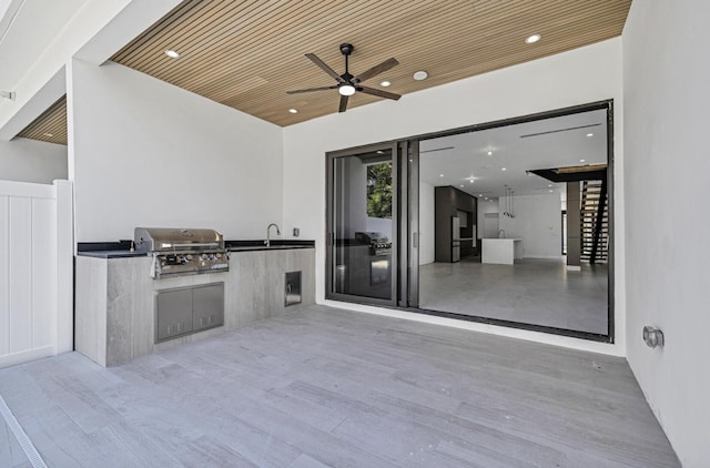 1233 NE 12th Ave Unit A, Fort Lauderdale, FL 33304 - view of patio / terrace featuring a ceiling fan and a sink