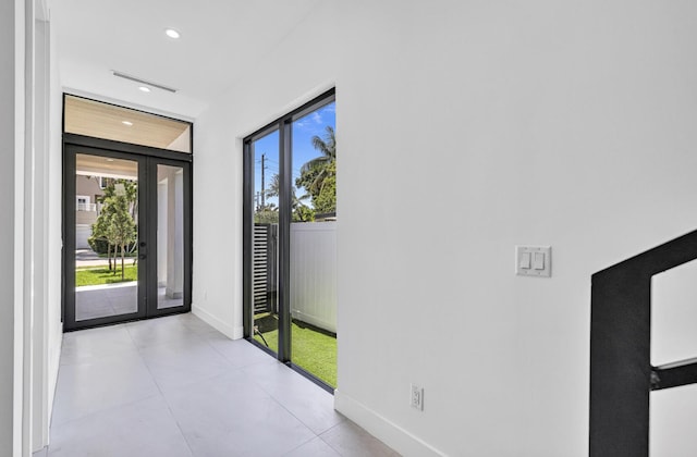 1233 NE 12th Ave Unit A, Fort Lauderdale, FL 33304 - empty room with recessed lighting, baseboards, and french doors