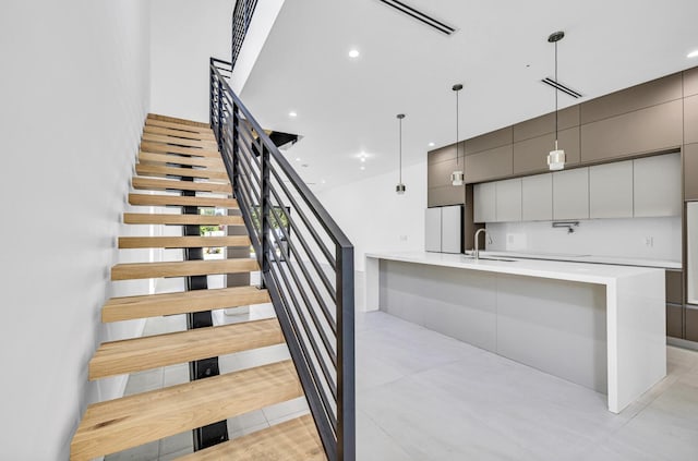 1233 NE 12th Ave Unit A, Fort Lauderdale, FL 33304 - staircase with recessed lighting