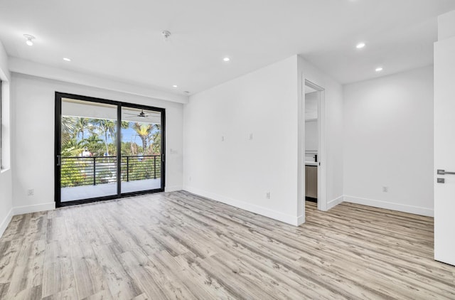 1233 NE 12th Ave Unit A, Fort Lauderdale, FL 33304 - empty room with light wood-style flooring, recessed lighting, baseboards, and fire sprinkler in ceiling