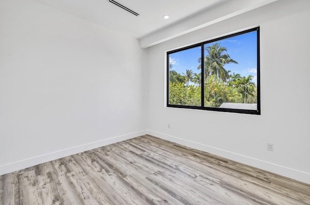 1233 NE 12th Ave Unit A, Fort Lauderdale, FL 33304 - unfurnished room with wood finished floors, baseboards, and recessed lighting