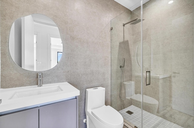 1233 NE 12th Ave Unit A, Fort Lauderdale, FL 33304 - bathroom with vanity, toilet, a stall shower, and tile walls