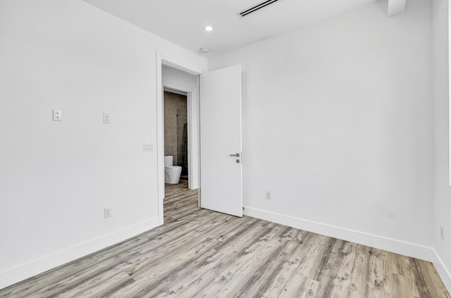 1233 NE 12th Ave Unit A, Fort Lauderdale, FL 33304 - unfurnished room featuring light wood finished floors, baseboards, and recessed lighting