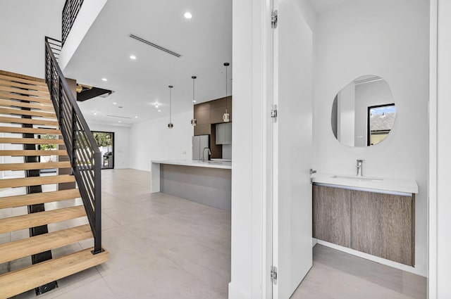 1233 NE 12th Ave Unit A, Fort Lauderdale, FL 33304 - bathroom with vanity and recessed lighting