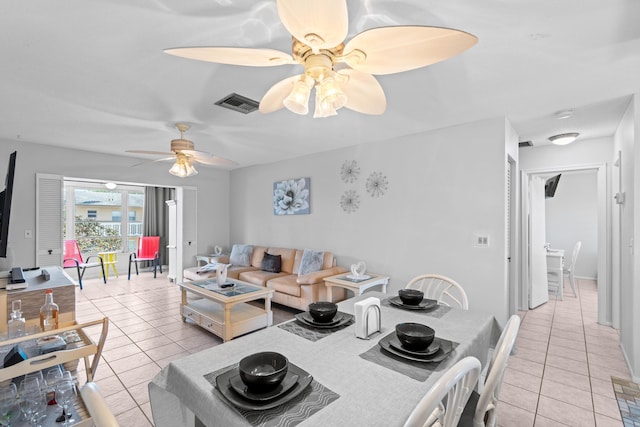2121 NE 1st Ct Unit 202, Boynton Beach, FL 33435 - dining area with light tile patterned floors and ceiling fan