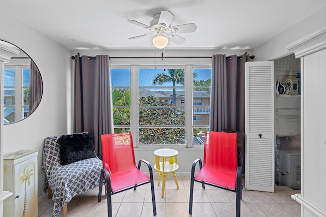 2121 NE 1st Ct Unit 202, Boynton Beach, FL 33435 - living area with ceiling fan and tile patterned floors