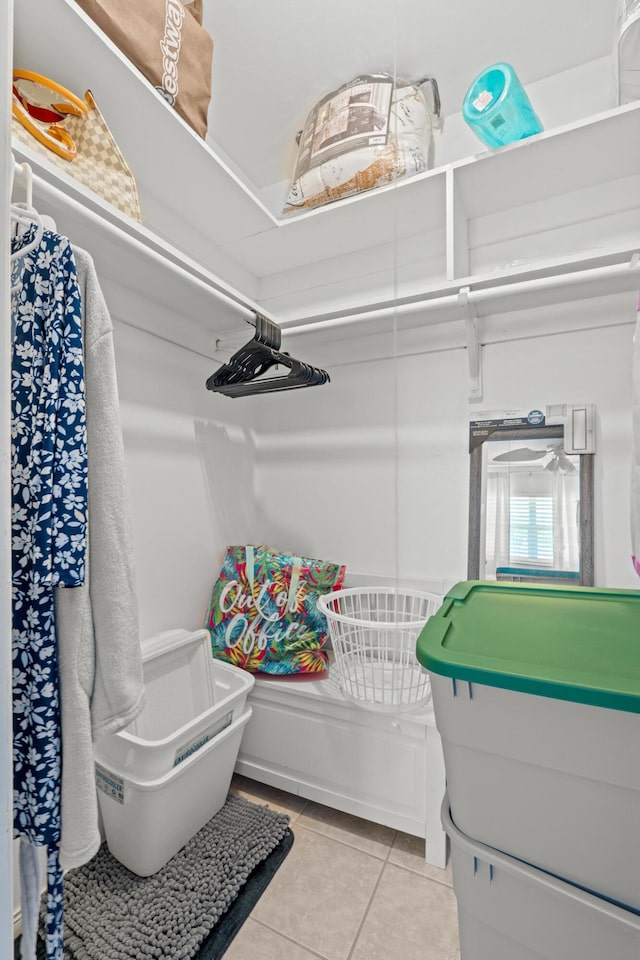 2121 NE 1st Ct Unit 202, Boynton Beach, FL 33435 - walk in closet with light tile patterned floors