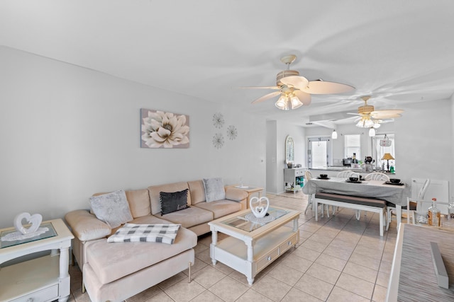 2121 NE 1st Ct Unit 202, Boynton Beach, FL 33435 - living area featuring a ceiling fan and light tile patterned floors