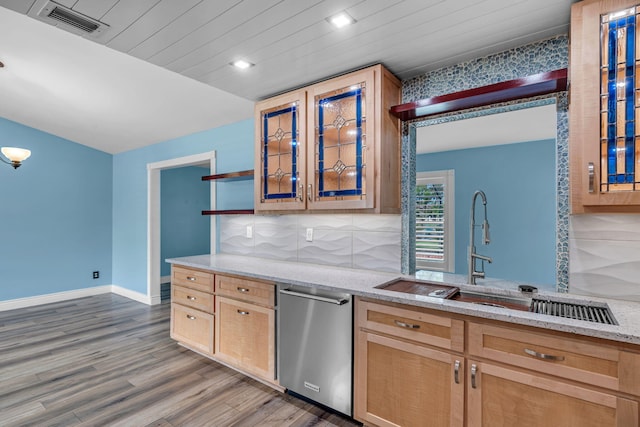 165 Cordoba Cir, Royal Palm Beach, FL 33411 - kitchen featuring stainless steel dishwasher, wood finished floors, decorative backsplash, glass insert cabinets, and light stone counters