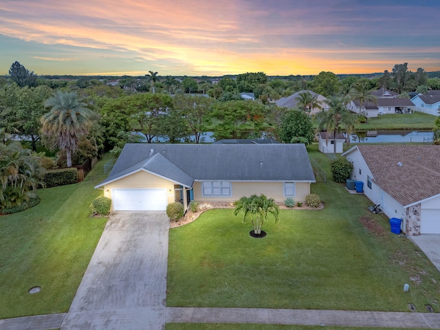165 Cordoba Cir, Royal Palm Beach, FL 33411 - view of aerial view at dusk