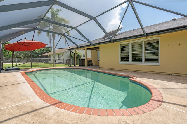 165 Cordoba Cir, Royal Palm Beach, FL 33411 - view of swimming pool featuring a patio area and glass enclosure