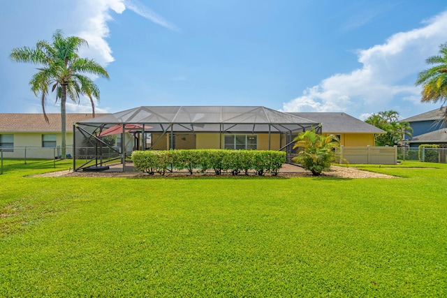 165 Cordoba Cir, Royal Palm Beach, FL 33411 - rear view of house with glass enclosure and stucco siding