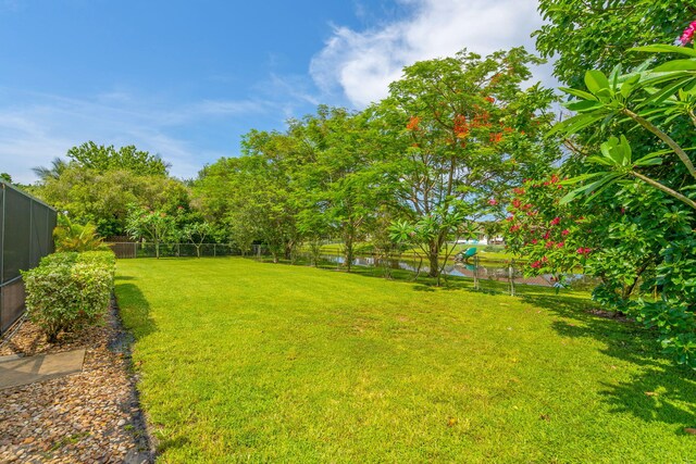 165 Cordoba Cir, Royal Palm Beach, FL 33411 - view of yard with a water view