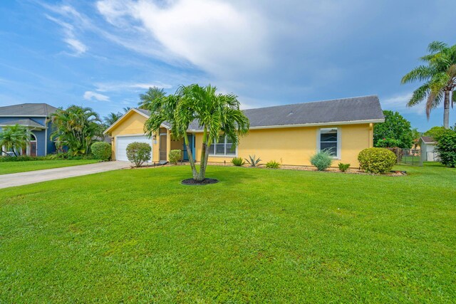 165 Cordoba Cir, Royal Palm Beach, FL 33411 - ranch-style home featuring stucco siding, concrete driveway, and a garage