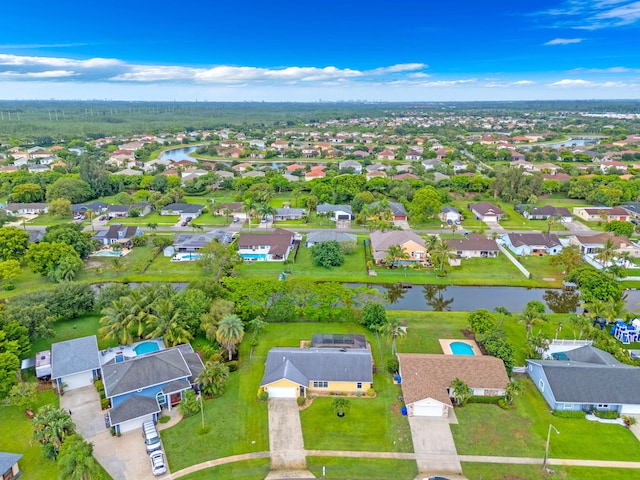 165 Cordoba Cir, Royal Palm Beach, FL 33411 - aerial overview of property's location with a large body of water and nearby suburban area