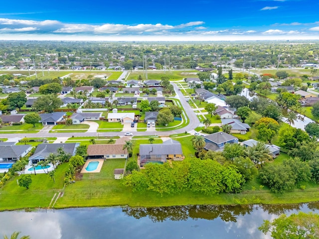 165 Cordoba Cir, Royal Palm Beach, FL 33411 - aerial overview of property's location with a nearby body of water and a pool
