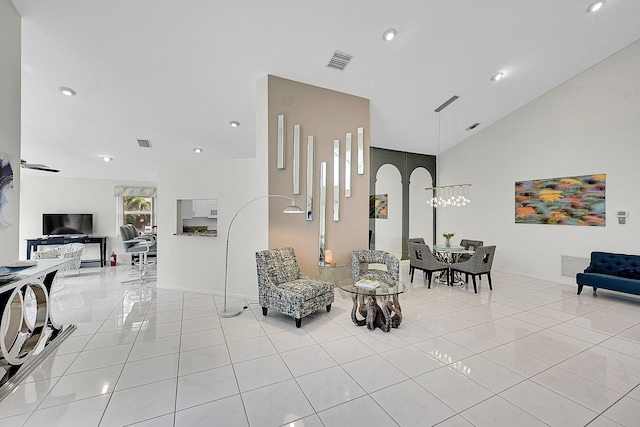 6078 Slice Ct, Boynton Beach, FL 33437 - living room featuring light tile patterned floors, recessed lighting, and high vaulted ceiling
