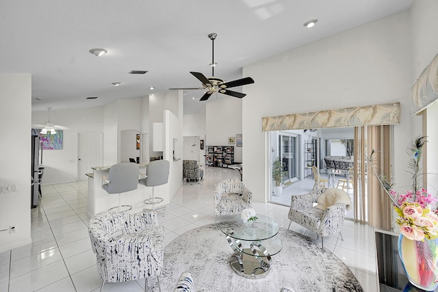 6078 Slice Ct, Boynton Beach, FL 33437 - living room with light tile patterned floors, a ceiling fan, high vaulted ceiling, and recessed lighting