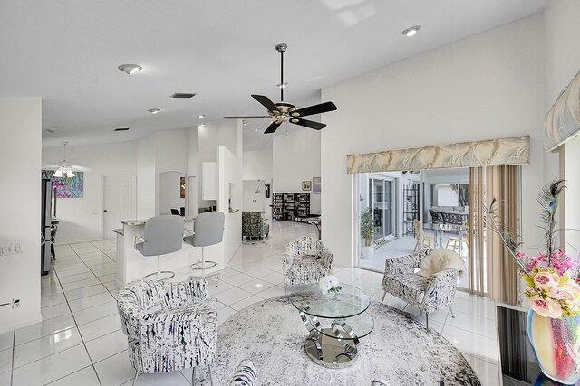 6078 Slice Ct, Boynton Beach, FL 33437 - living area featuring light tile patterned floors, ceiling fan, high vaulted ceiling, and recessed lighting