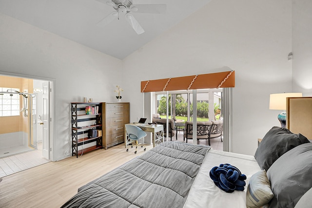 6078 Slice Ct, Boynton Beach, FL 33437 - bedroom featuring high vaulted ceiling, wood finished floors, access to exterior, a desk, and ensuite bathroom