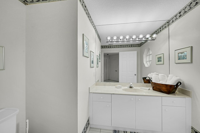 6078 Slice Ct, Boynton Beach, FL 33437 - half bathroom with toilet, vanity, and a textured ceiling