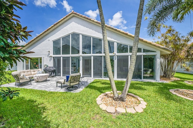6078 Slice Ct, Boynton Beach, FL 33437 - back of property featuring stucco siding, a patio area, a yard, and a tile roof