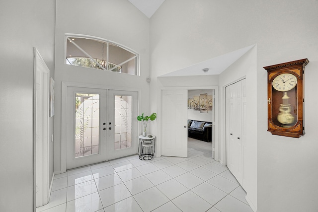6078 Slice Ct, Boynton Beach, FL 33437 - foyer featuring high vaulted ceiling, french doors, and light tile patterned floors