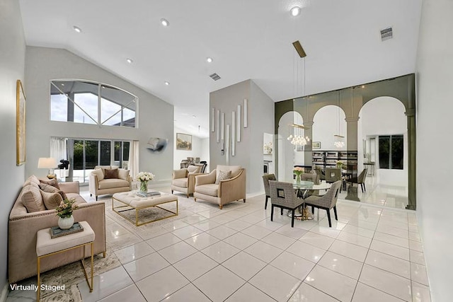 6078 Slice Ct, Boynton Beach, FL 33437 - living room with high vaulted ceiling, light tile patterned flooring, a chandelier, and recessed lighting