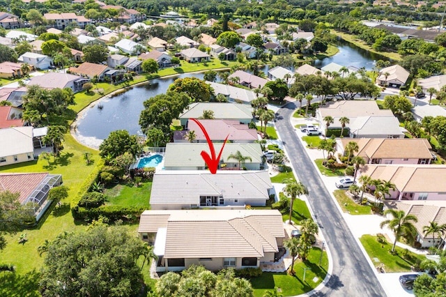 2802 Waters Edge Cir, Greenacres, FL 33413 - aerial perspective of suburban area featuring a nearby body of water